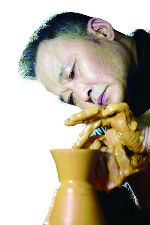 修光明：一窑炉火炼“福禄”